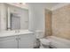 Updated bathroom with white vanity and beige tile at 18202 Cave Creek Rd # 111, Phoenix, AZ 85032
