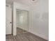 Bright bedroom with mirrored closet doors and laminate wood flooring at 18202 Cave Creek Rd # 111, Phoenix, AZ 85032