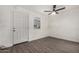 Bright bedroom with grey vinyl flooring and ceiling fan at 18202 Cave Creek Rd # 111, Phoenix, AZ 85032