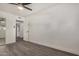 Bright bedroom with wood-look floors and mirrored closet at 18202 Cave Creek Rd # 111, Phoenix, AZ 85032