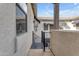 Small balcony with metal railing and view of neighboring building at 530 S Emerson St, Chandler, AZ 85225