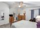 Bright bedroom with double dresser and a view of the bathroom at 437 E Germann Rd # 68, San Tan Valley, AZ 85140