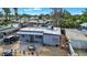 Aerial view of a house with a backyard patio and detached garages at 220 N Horne --, Mesa, AZ 85203