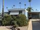Mobile home with carport and landscaping at 4065 E University Dr # 300, Mesa, AZ 85205