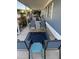 Relaxing covered patio with seating area and outdoor rug at 4065 E University Dr # 300, Mesa, AZ 85205