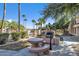 Community picnic area with BBQ grill and seating at 10030 W Indian School Rd # 218, Phoenix, AZ 85037
