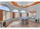 Charming breakfast nook with arched windows offering scenic views at 1216 Easy St, Wickenburg, AZ 85390