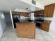 Kitchen with granite counters, stainless steel appliances, and island at 3023 W Larkspur Dr, Phoenix, AZ 85029