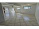 Spacious living room with tile floors and ceiling fan at 3023 W Larkspur Dr, Phoenix, AZ 85029