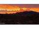 Sunset over desert landscape with mountains in the background at 43630 N 20Th St, New River, AZ 85087