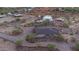 Aerial view showing a house, detached garage, and expansive desert landscape at 43630 N 20Th St, New River, AZ 85087