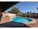 Inviting kidney-shaped pool surrounded by brick patio at 4815 W Las Palmaritas Dr, Glendale, AZ 85302