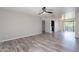 Spacious living room with wood-look floors and lots of natural light at 4950 N Miller Rd # 233, Scottsdale, AZ 85251