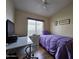 Bright bedroom with a desk, chair, and a double bed at 8700 E University Dr # 1931, Mesa, AZ 85207