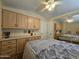 Bedroom with built-in cabinets and a mirrored closet at 8700 E University Dr # 1931, Mesa, AZ 85207