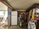 Storage room with refrigerator, shelves, and sporting goods at 8700 E University Dr # 1931, Mesa, AZ 85207