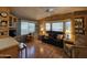 Spacious living room with hardwood floors and a cozy seating area at 8700 E University Dr # 1931, Mesa, AZ 85207