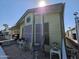 Mobile home exterior with carport and covered patio at 8700 E University Dr # 1931, Mesa, AZ 85207
