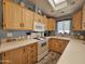 Well-equipped kitchen with ample cabinetry and modern appliances at 8700 E University Dr # 1931, Mesa, AZ 85207