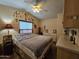 Bedroom with a double bed, ceiling fan, and dresser at 8700 E University Dr # 1931, Mesa, AZ 85207