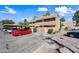 Two-story stucco building with parking and landscaping at 1425 E Desert Cove N Ave # 30, Phoenix, AZ 85020