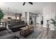 Bright and airy living room with hardwood floors, comfortable seating, and an open floor plan at 20903 S 185Th Way, Queen Creek, AZ 85142