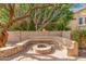Inviting backyard patio with fire pit and seating area at 1367 E Desert Flower Ln, Phoenix, AZ 85048