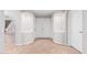 Elegant hallway with neutral-toned tile floors and built-in niches at 1367 E Desert Flower Ln, Phoenix, AZ 85048