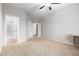 Spacious bedroom with an ensuite bathroom and carpet flooring at 1367 E Desert Flower Ln, Phoenix, AZ 85048