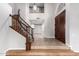 Impressive staircase with ornate railing and high ceilings at 1367 E Desert Flower Ln, Phoenix, AZ 85048