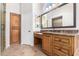 Bathroom with walk-in shower, double vanity and linen closet at 1367 E Desert Flower Ln, Phoenix, AZ 85048