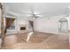 Living room features hardwood floors, fireplace, and large windows at 1367 E Desert Flower Ln, Phoenix, AZ 85048