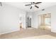 Well-lit bedroom with mirrored closet doors at 1367 E Desert Flower Ln, Phoenix, AZ 85048