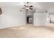 Large bedroom with carpeted floors and a ceiling fan at 1367 E Desert Flower Ln, Phoenix, AZ 85048