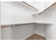 Large walk-in closet with ample shelving and hanging space at 1367 E Desert Flower Ln, Phoenix, AZ 85048