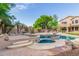 Inviting pool area with spa and patio at 1367 E Desert Flower Ln, Phoenix, AZ 85048