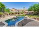 Stunning pool and two-story home view at 1367 E Desert Flower Ln, Phoenix, AZ 85048