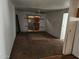 Living room with carpet and a sliding glass door at 2833 W Marlette Ave, Phoenix, AZ 85017