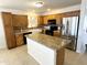 Spacious kitchen featuring granite countertops and stainless steel appliances at 1773 E Cardinal Dr, Casa Grande, AZ 85122