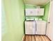 Laundry room with washer and dryer and ample cabinet space at 9427 E University Dr # 100, Mesa, AZ 85207