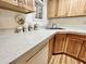 Charming kitchen with wood cabinets and speckled countertops at 9427 E University Dr # 100, Mesa, AZ 85207