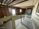 Unfinished garage with ramp and storage at 9427 E University Dr # 100, Mesa, AZ 85207