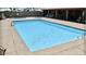 Community pool with plenty of space for relaxation at 9427 E University Dr # 100, Mesa, AZ 85207
