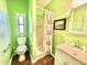 Bathroom with shower, toilet and a single vanity sink at 9427 E University Dr # 100, Mesa, AZ 85207