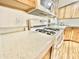 Bright kitchen features gas range, microwave, and light-colored countertops at 9427 E University Dr # 100, Mesa, AZ 85207