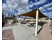 Covered patio area with tables and seating at 9427 E University Dr # 100, Mesa, AZ 85207