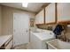 Laundry room with washer, dryer, and utility sink at 13636 W Aleppo Dr, Sun City West, AZ 85375