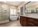 Bathroom with soaking tub, walk-in shower, and dual vanity at 20362 E Bronco Dr, Queen Creek, AZ 85142