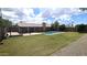Home with large backyard, pool and covered patio at 4442 E Aire Libre Ave, Phoenix, AZ 85032