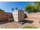 Tan colored plastic storage shed in backyard at 1050 E Indigo Dr, Chandler, AZ 85286